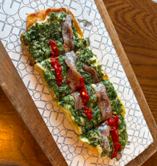 Ci Siamo signature dishes Pizza Bianca
Cavatelli Allo Scoglio
Chicken Milanese